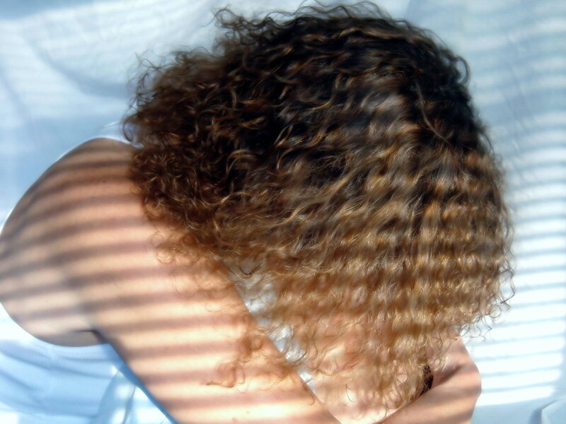 Person with Curly Hair — Brown