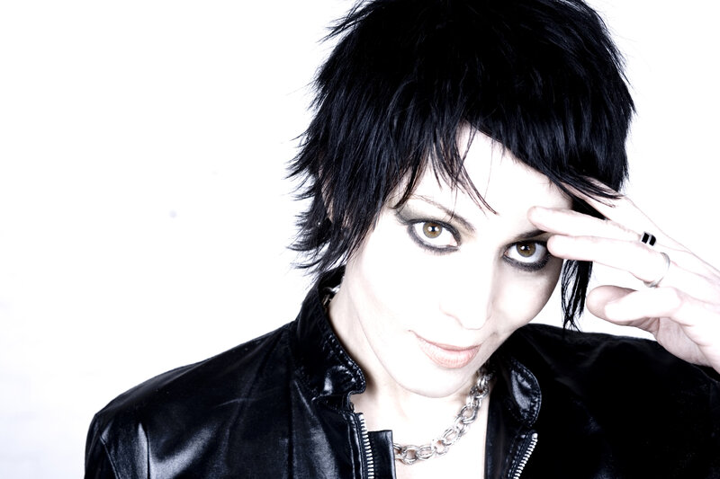 person with dark hair and makeup