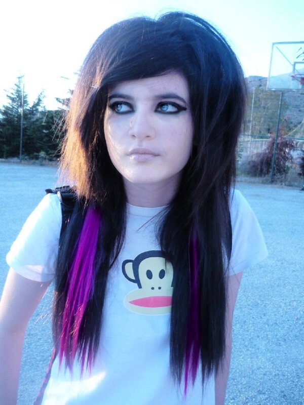 person with dark hair and purple streaks