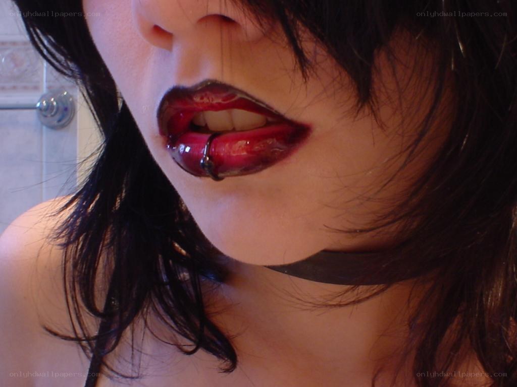 person with dark lipstick
