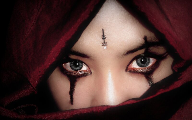 Person with Dark Makeup — Red