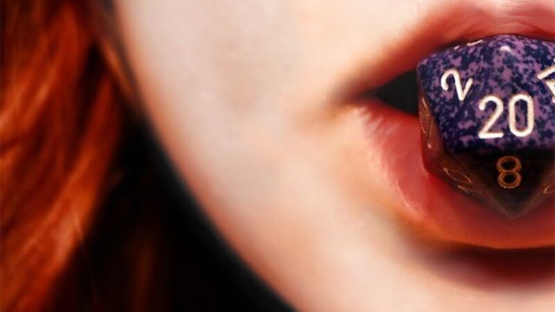 person with dice in mouth