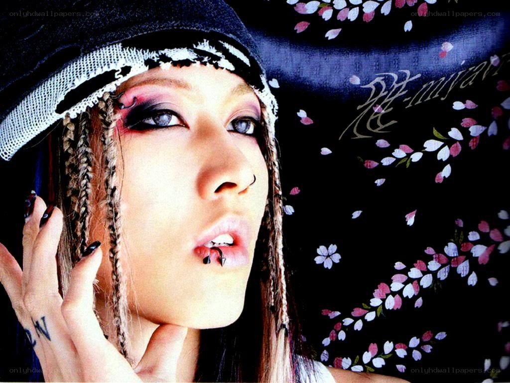 person with dramatic makeup and accessories