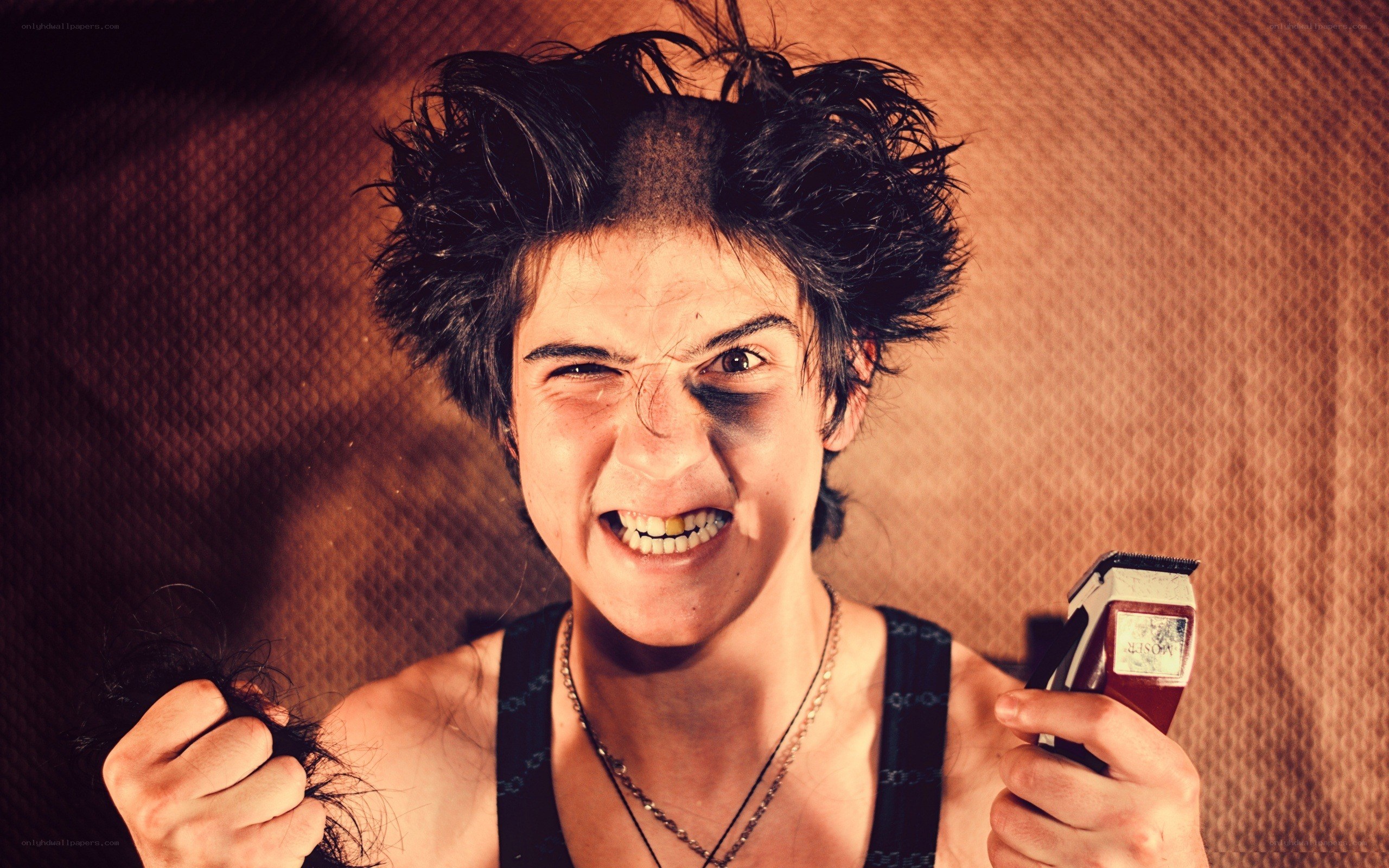 person with electric razor