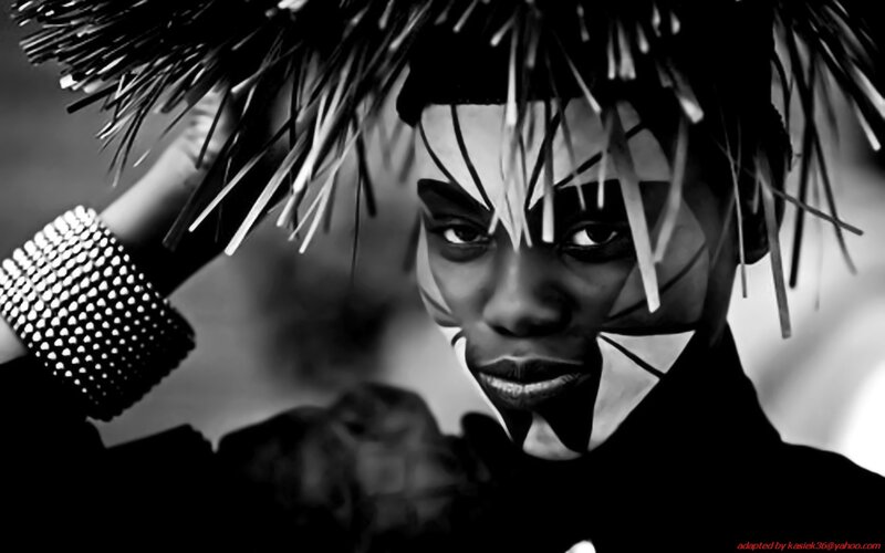 person with face paint and headpiece