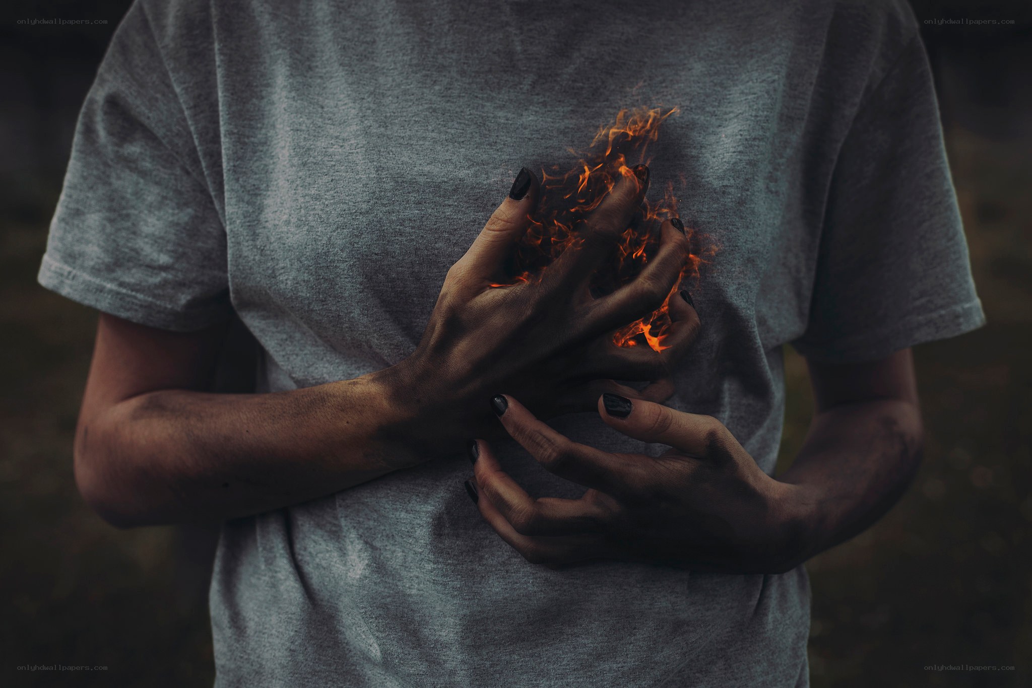 person with fire on chest