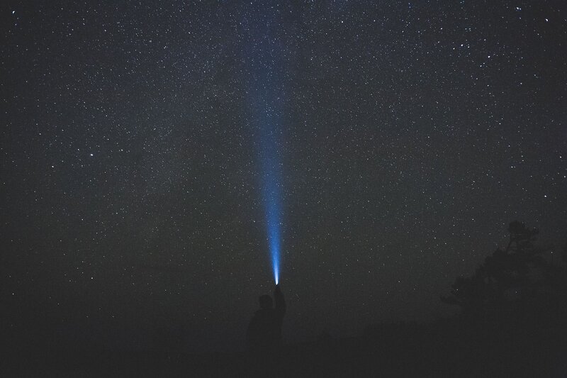 Person with Flashlight — Black, Serene