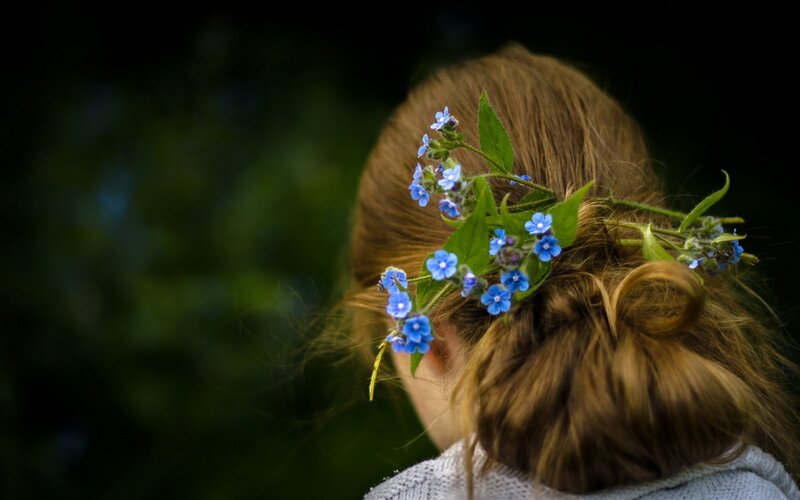 Person with Flowers in Hair