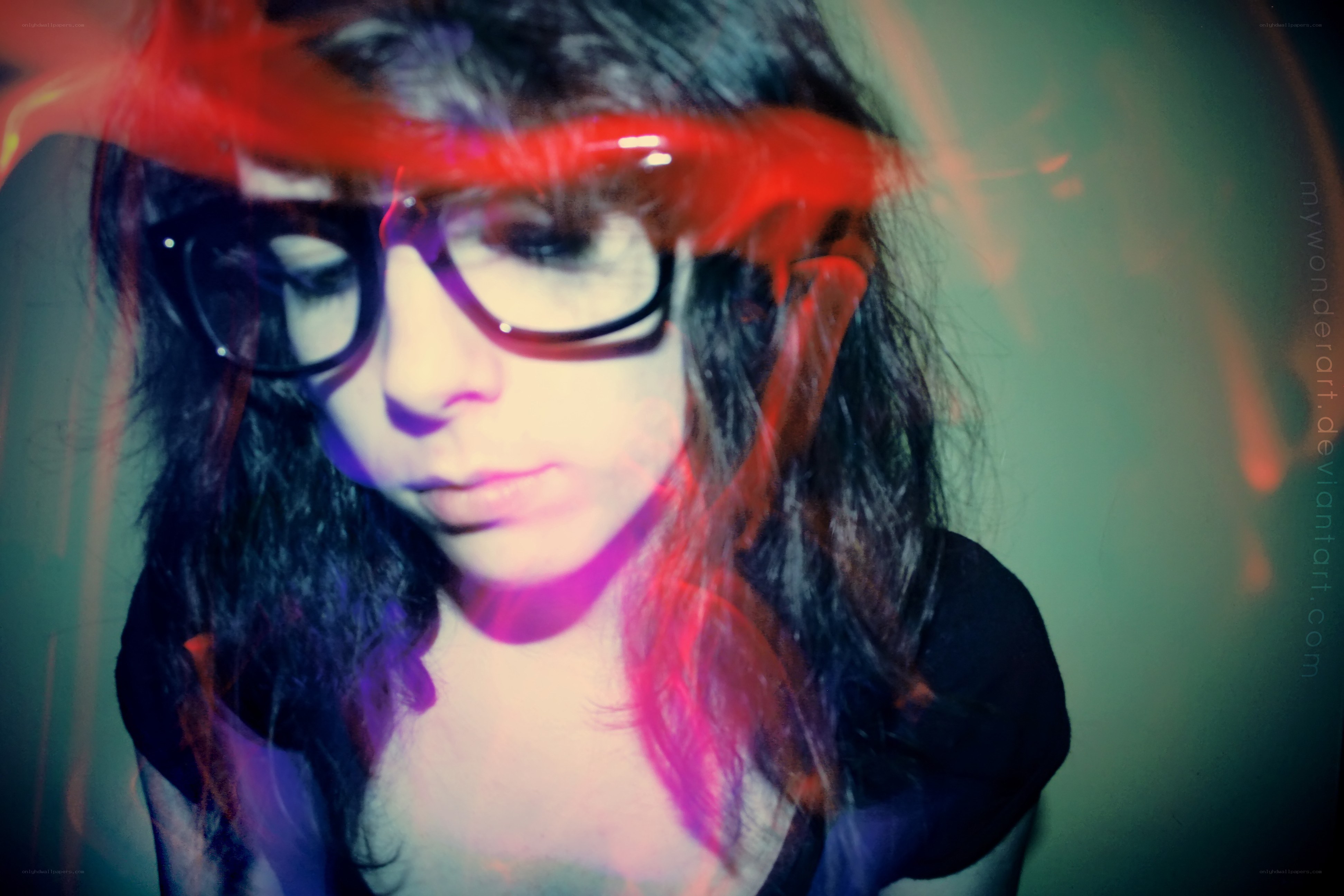 person with glasses and light effects