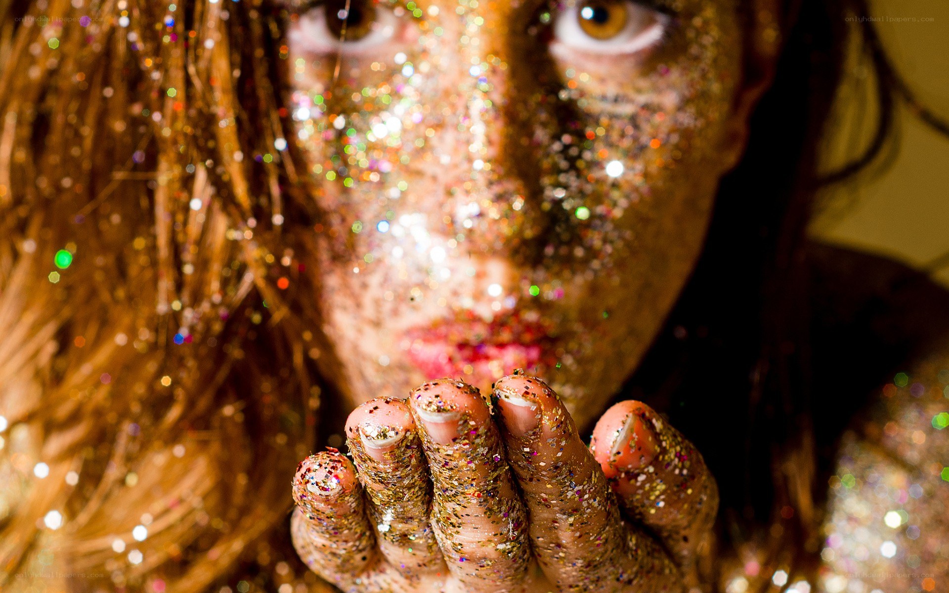 person with glitter on face