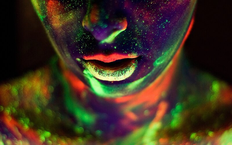 Person with Glowing Face Paint — Green, Dramatic, Night