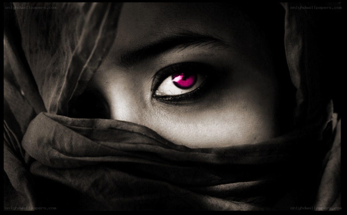 person with glowing pink eye