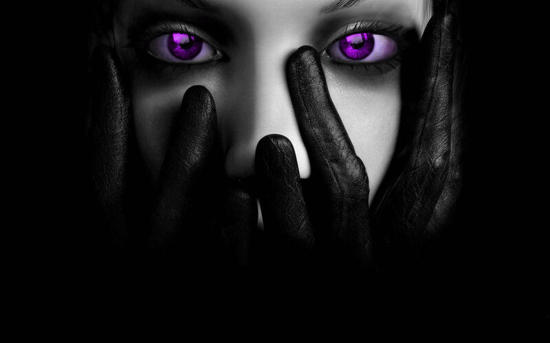 person with glowing purple eyes