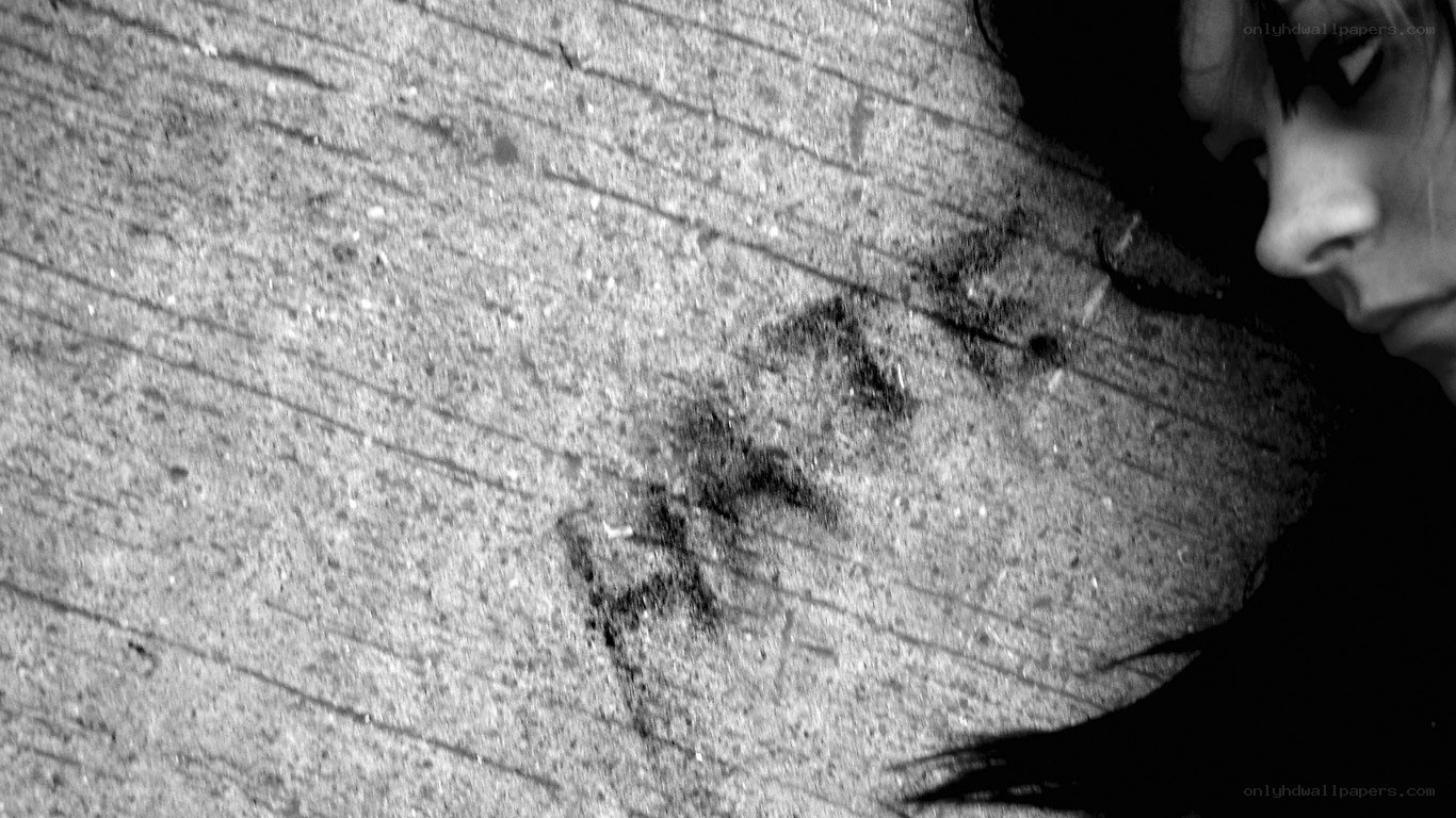 person with graffiti on ground