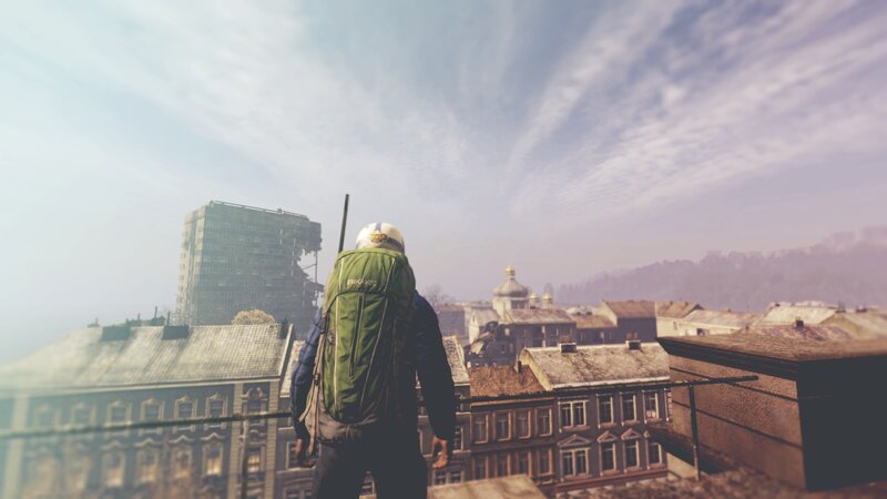Person with Green Backpack