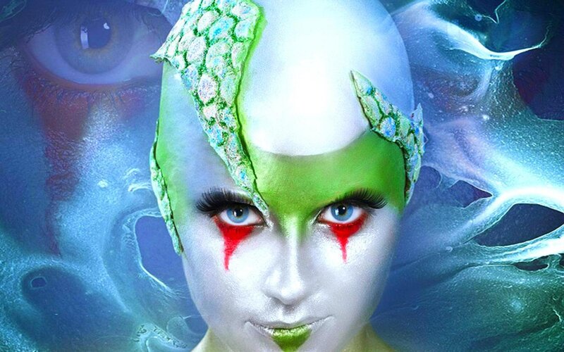 Person with Green Face Paint — Dramatic