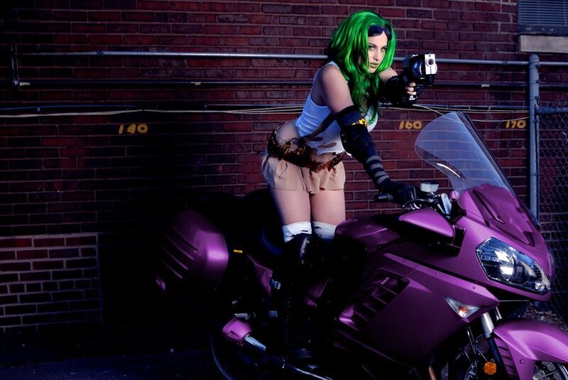 Person with Green Hair on Motorcycle