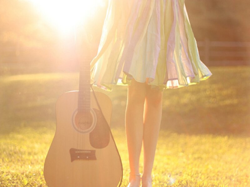 Person with Guitar — Yellow