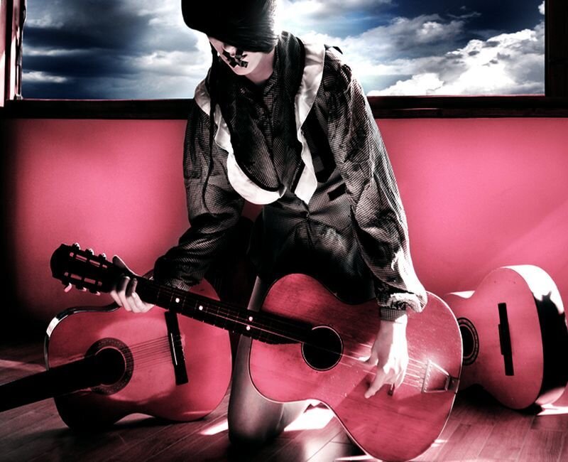 Person with Guitars