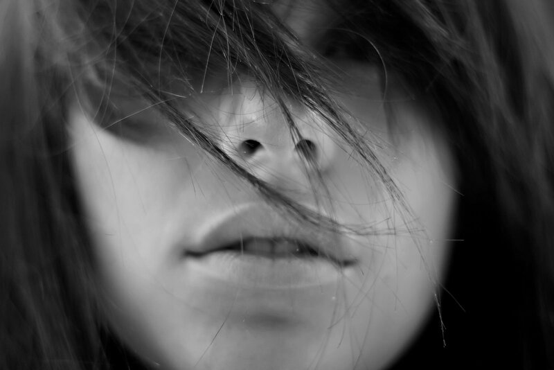Person with Hair over Face