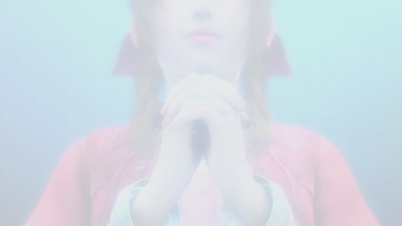person with hands clasped