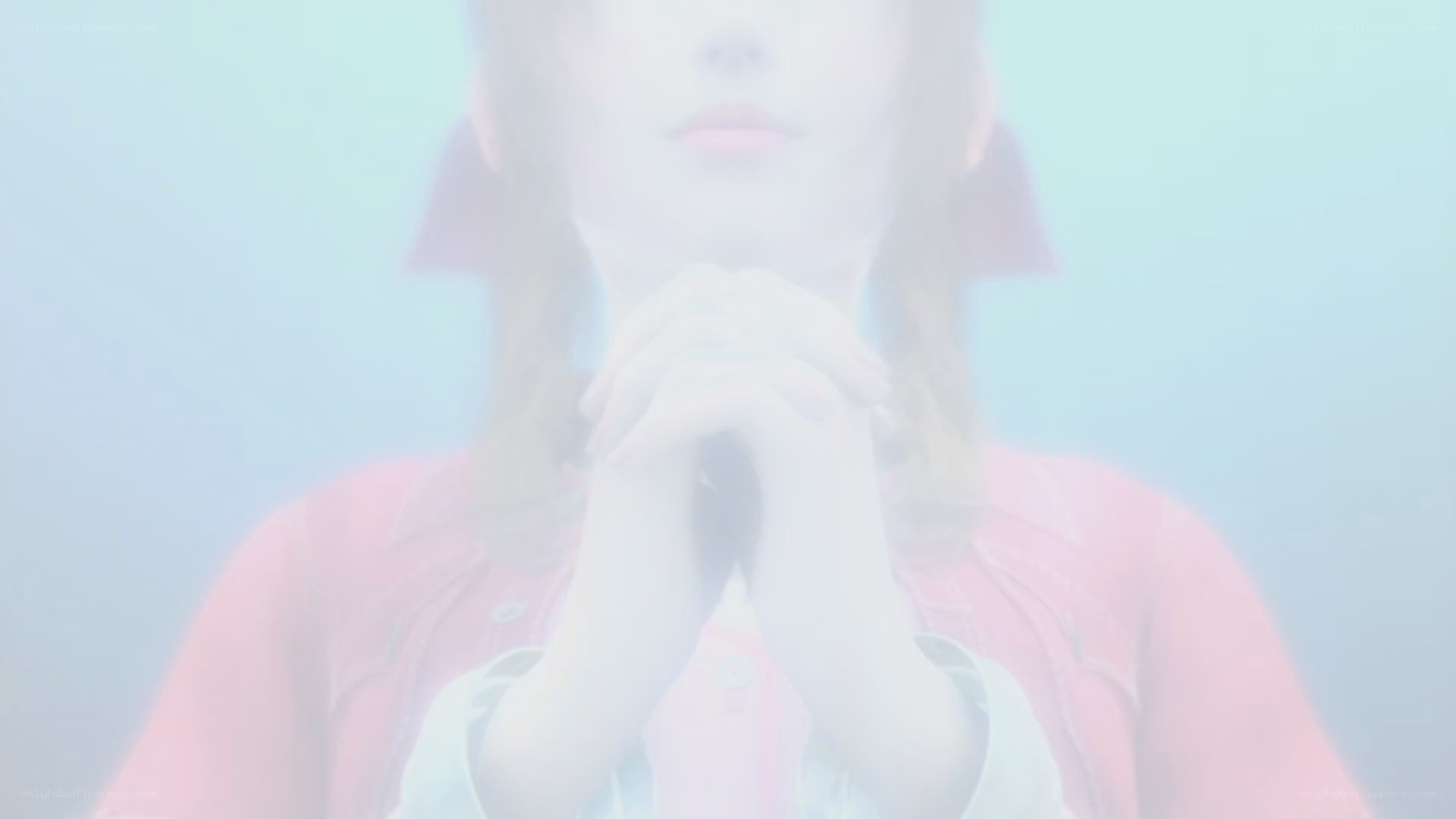 person with hands clasped