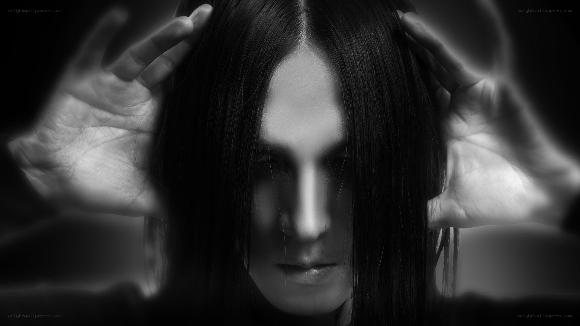 person with hands on head