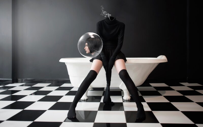 Person with Head in Bubble