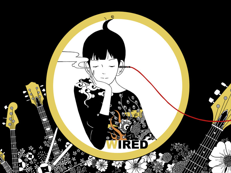 person with headphones and guitars