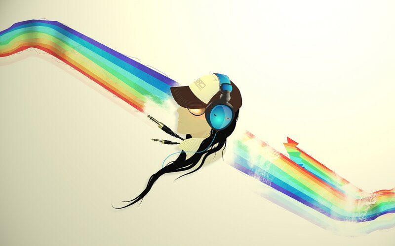 person with headphones and rainbow