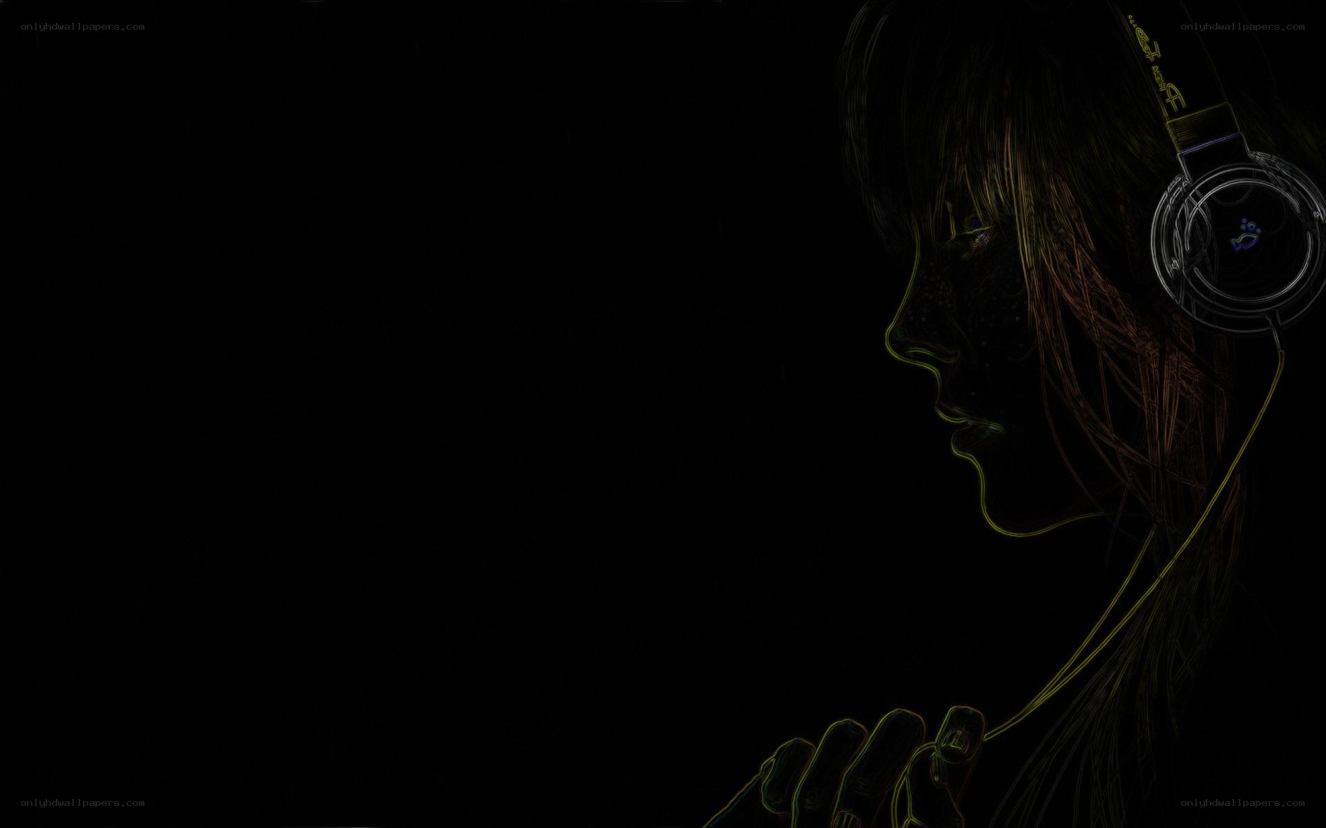 person with headphones in dark