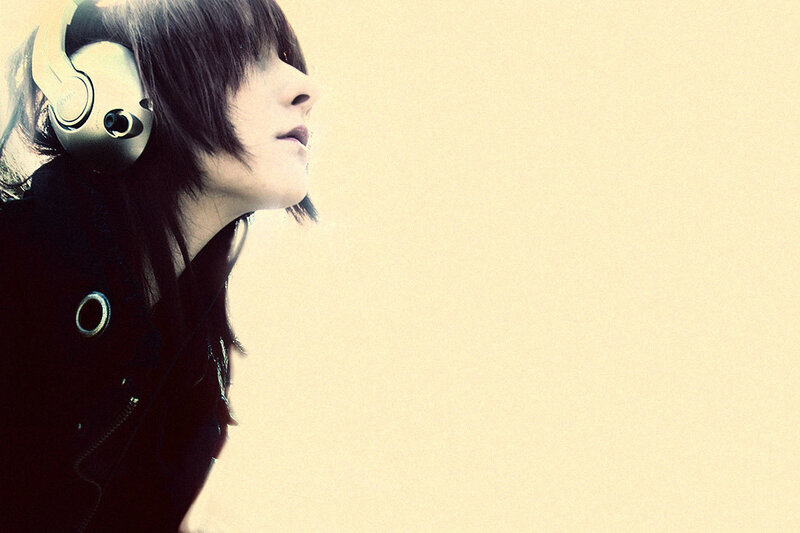 person with headphones in profile