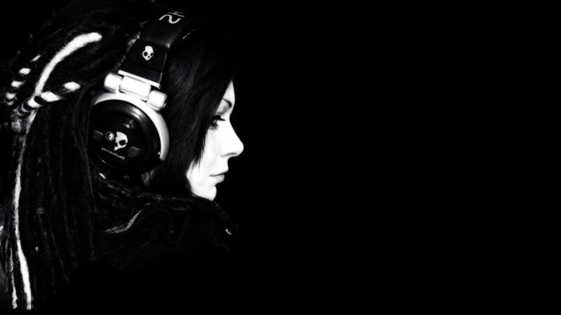 person with headphones in profile