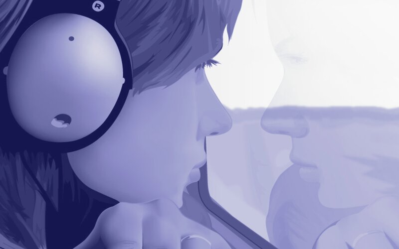 person with headphones in profile