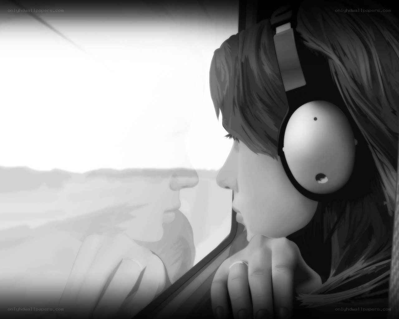 person with headphones looking out window