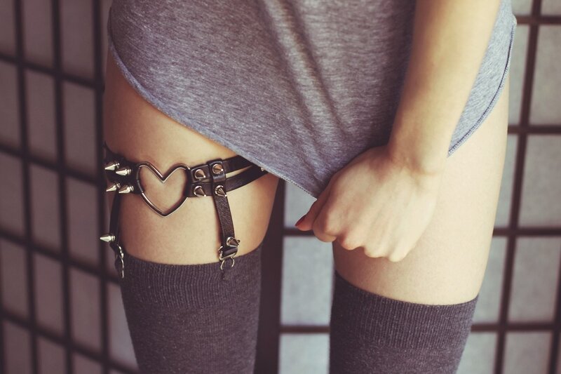 person with heart garter belt