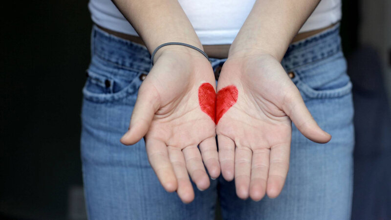 Person with Heart on Palms