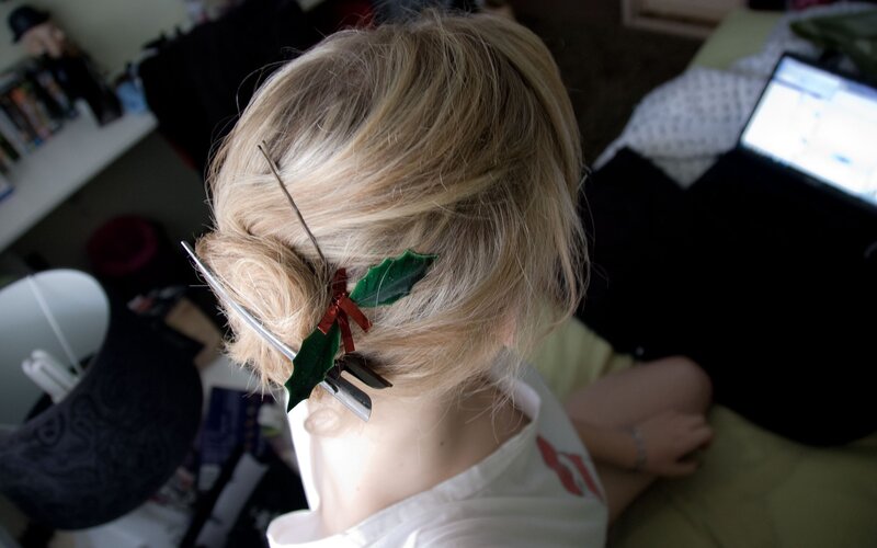 person with holiday hair accessory