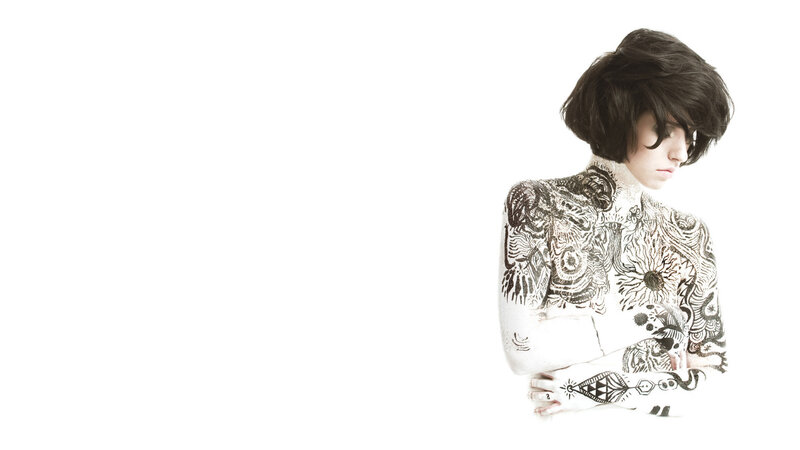 person with intricate body art