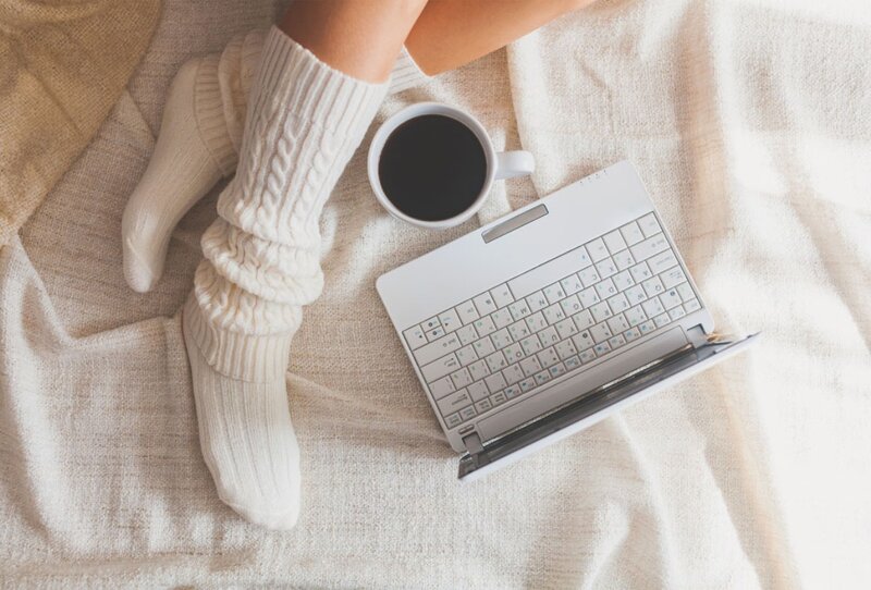 Person with Laptop and Coffee