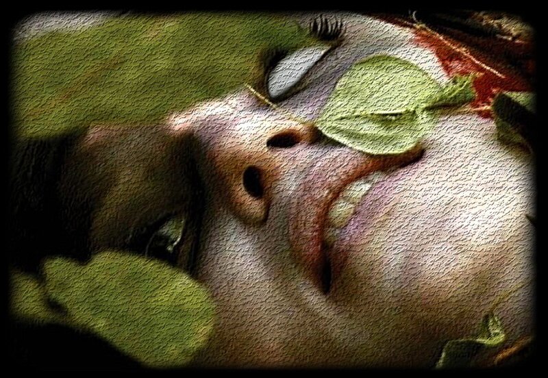 Person with Leaves on Face