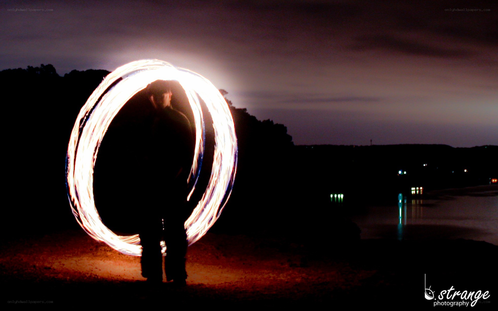 Person with light circle at night