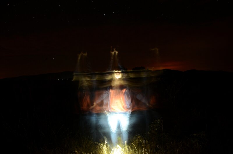 Person with light trails at night