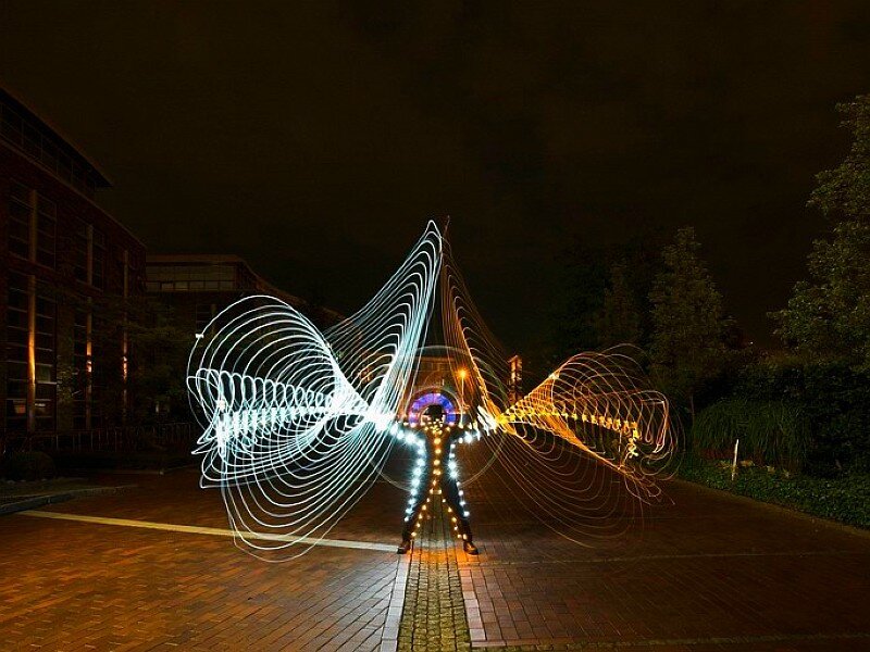 Person with Light Trails — Black, Dramatic