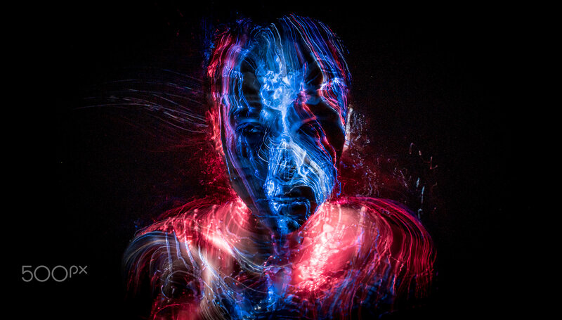 Person with Light Trails — Blue