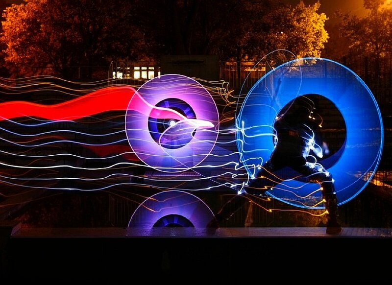 Person with Light Wheels — Blue