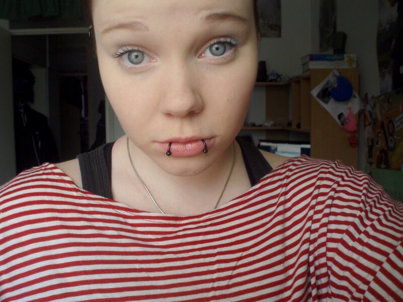 person with lip piercing