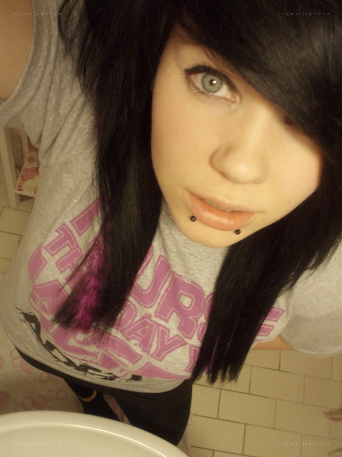 person with lip piercings