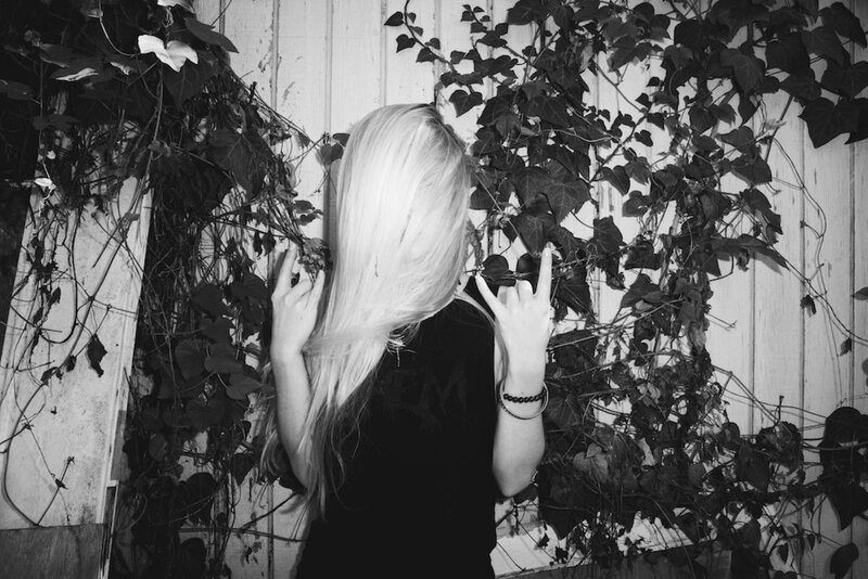 person with long blonde hair
