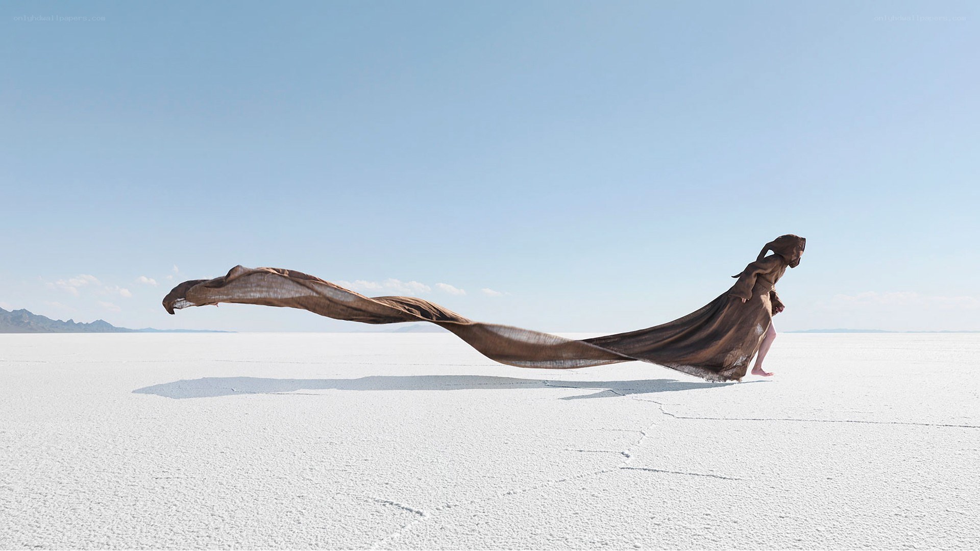 Person with long flowing fabric